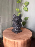 735g natural Larvikite wolf crystal carving featuring shimmering silver feldspar flashes and detailed wolf craftsmanship.