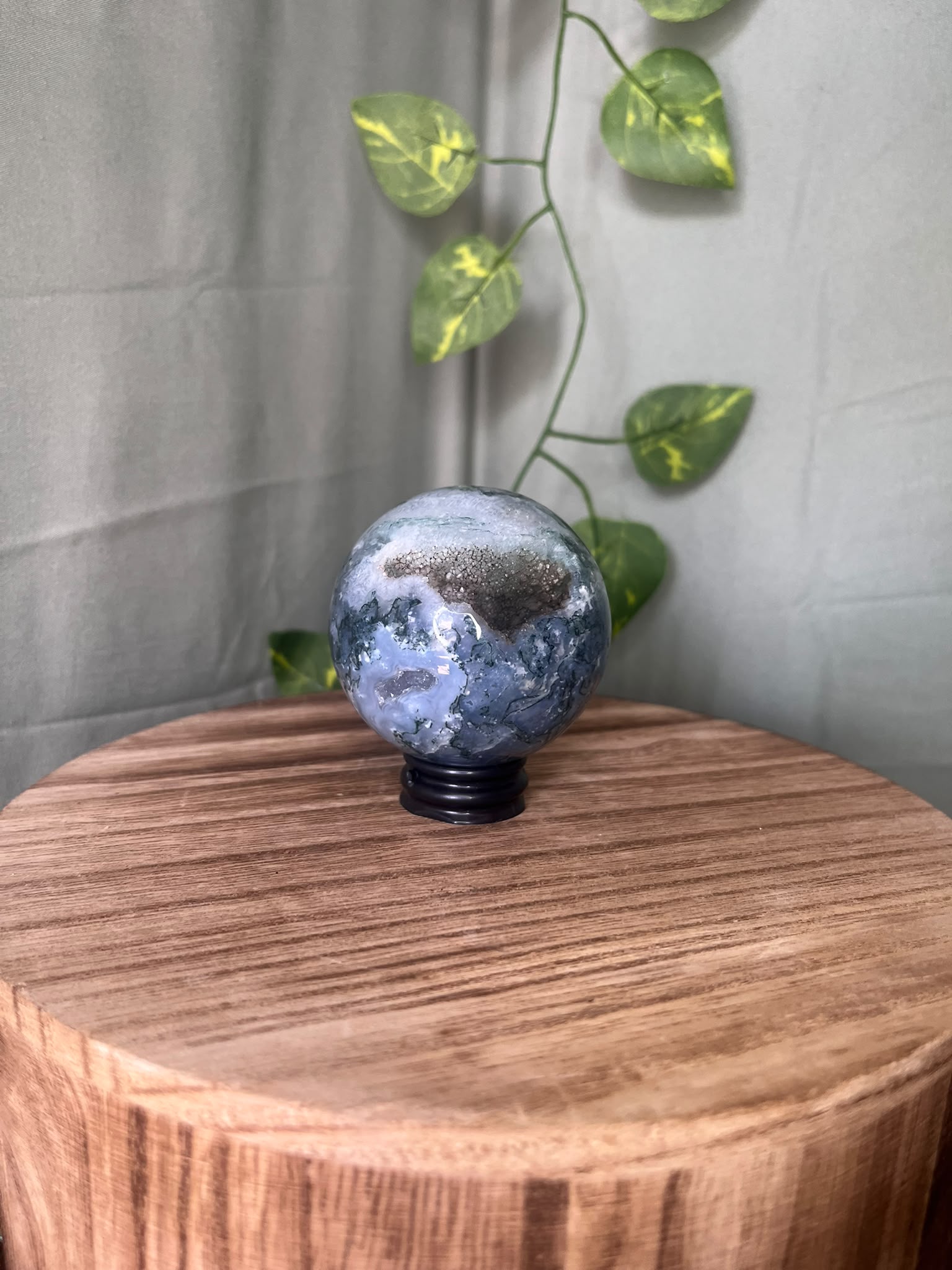 252g natural Moss Agate crystal sphere featuring green moss-like inclusions and a sparkling druzy quartz pocket