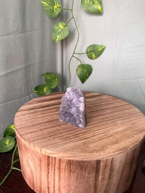 54g natural Amethyst cluster featuring sparkling lavender-purple Quartz crystal points on a freestanding formation.