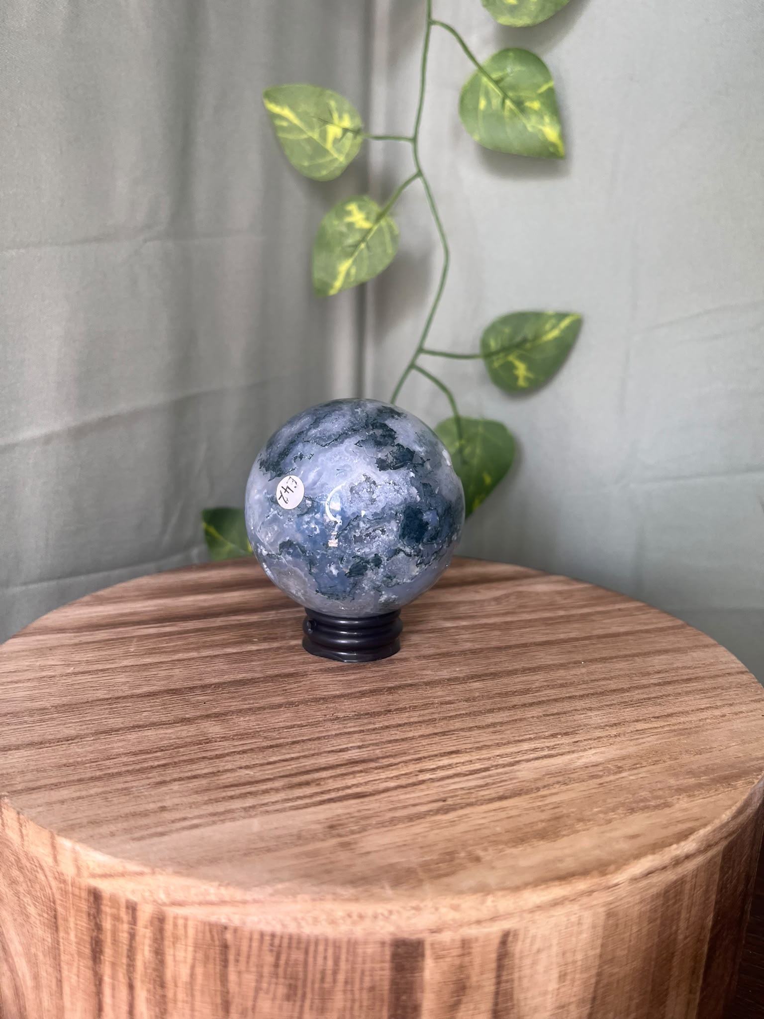 252g natural Moss Agate crystal sphere featuring green moss-like inclusions and a sparkling druzy quartz pocket