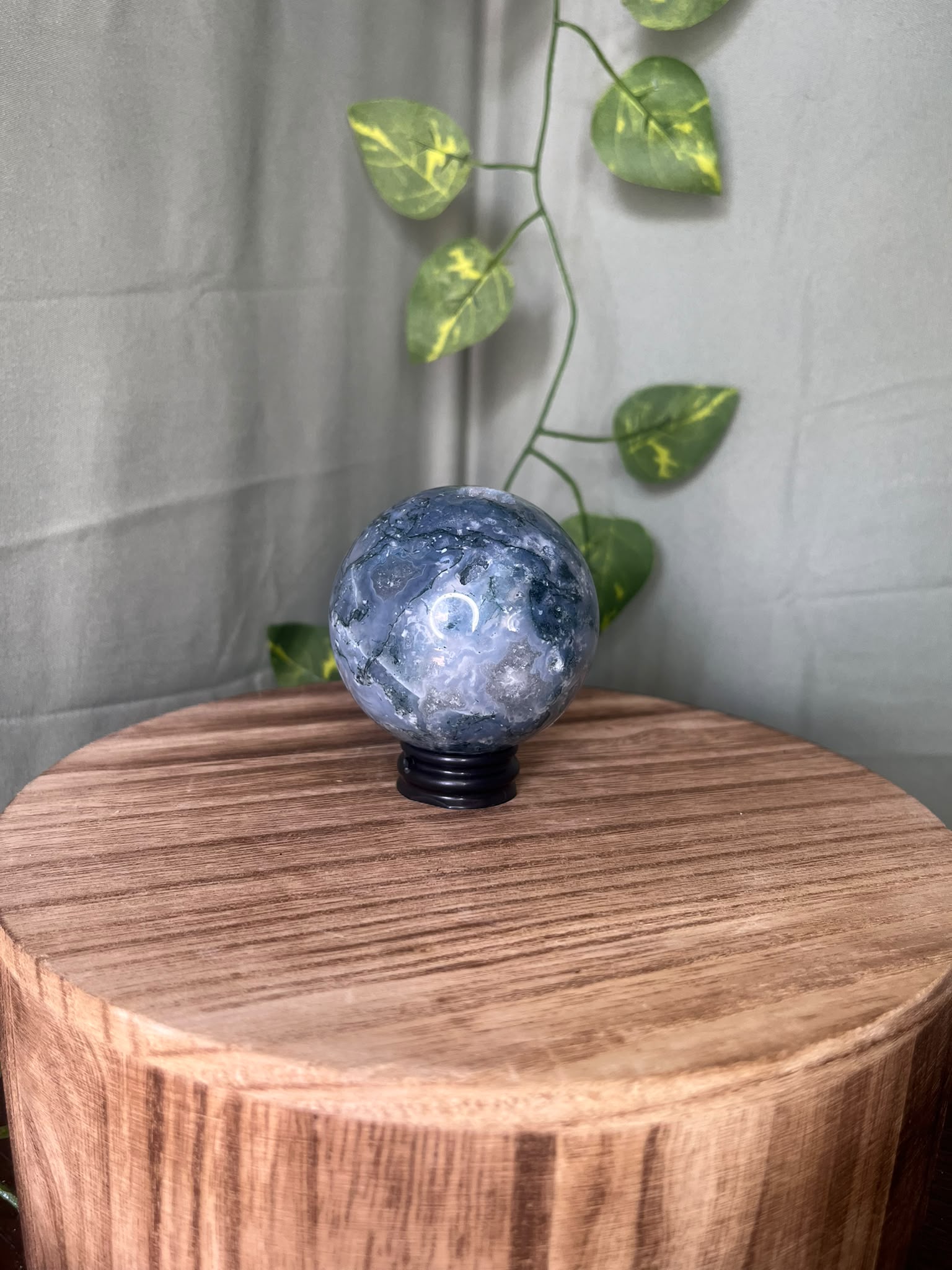252g natural Moss Agate crystal sphere featuring green moss-like inclusions and a sparkling druzy quartz pocket